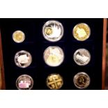 Coin case containing a quantity of coins and tokens. P&P Group 2 (£18+VAT for the first lot and £3+