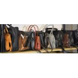 Twelve ladies new and nearly new handbags with a folio case. Not available for in-house P&P