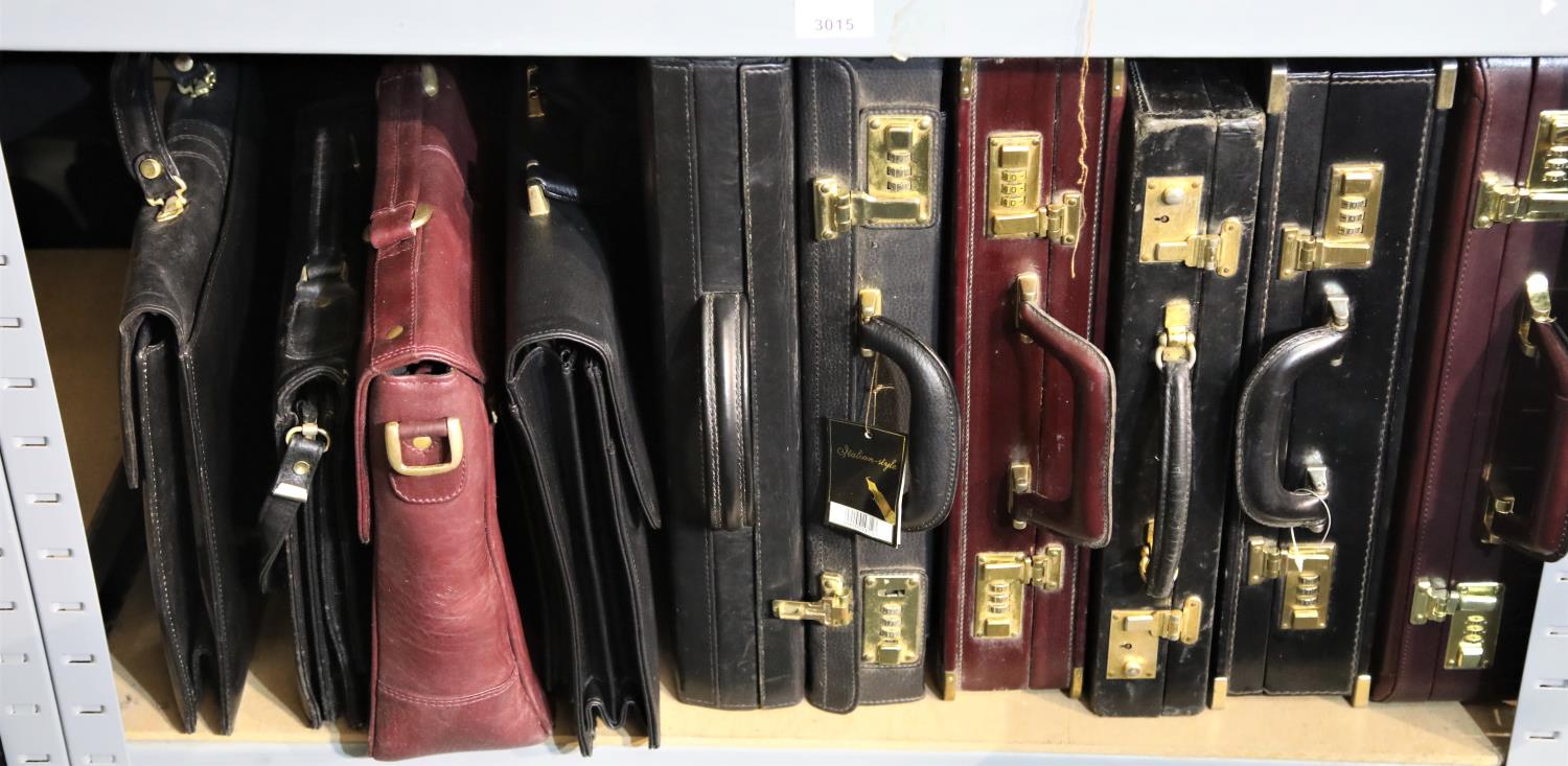 Twelve mixed leather briefcases. Not available for in-house P&P