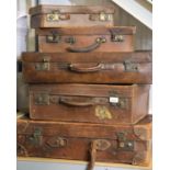 Five vintage leather suitcases, largest 60 x 40 cm. Not available for in-house P&P