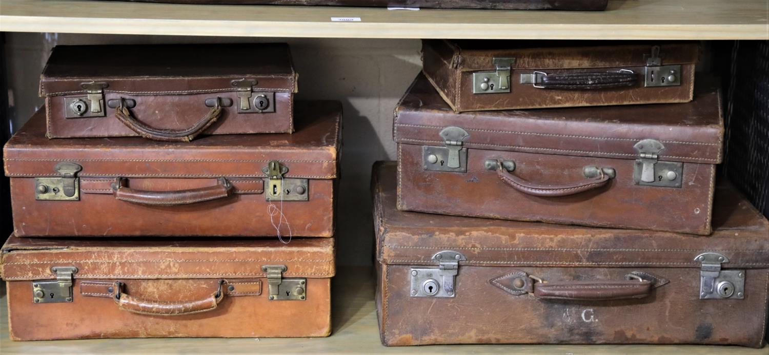 Six vintage leather suitcases. Not available for in-house P&P