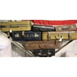Seven vintage non-leather suitcases, including Revelation and Samsonite. Not available for in-