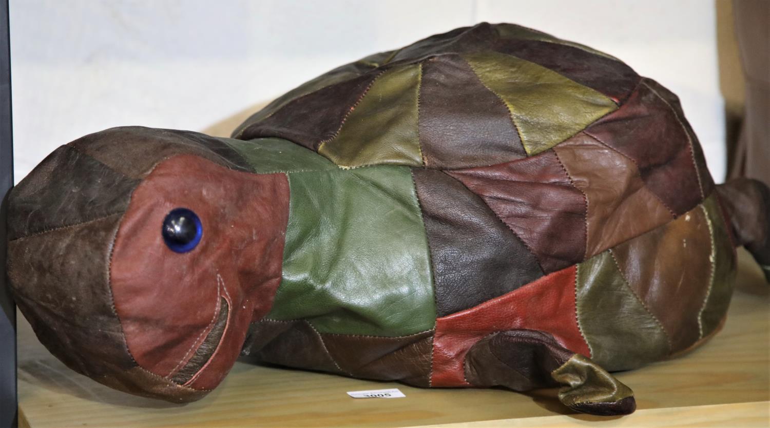 A 1970's leather turtle pouffe. P&P Group 3 (£25+VAT)