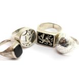 Four 925 silver assorted rings, various sizes, including a signet example. P&P Group 1 (£14+VAT
