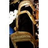 Antique Far Eastern brass and copper bound duet camel saddle with Arabic description, L: 130 cm.