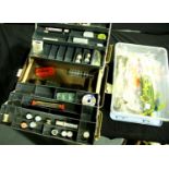 Box of coloured feathers and a tackle box of fly tying items. Not available for in-house P&P
