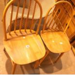 Pair of beech spindle back chairs. Not available for in-house P&P
