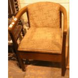 Upholstered tub commode chair lacking pot. Not available for in-house P&P