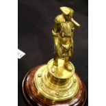 Brass table lighter on a circular base in the form of a smoking pirate. P&P Group 2 (£18+VAT for the