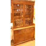 Mahogany two drawer/two door display cabinet with two door glazed upper section. Not available for