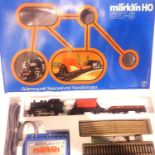 Marklin 2934 HO 3 rail train set; 0.6.0 tank loco, tipper wagon, flat wagon, track and controller.