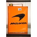 Orange McLaren petrol can, H: 34 cm. P&P Group 2 (£18+VAT for the first lot and £3+VAT for