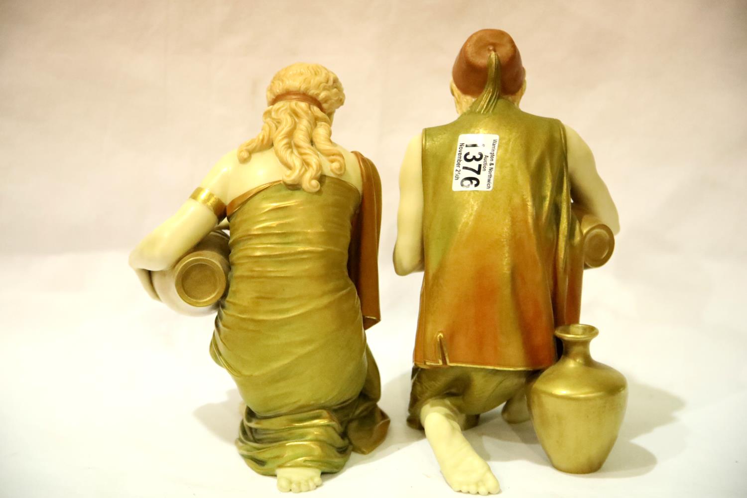 A pair of Royal Worcester figures of water carriers, after James Hadley, H: 25 cm, no visible chips, - Image 3 of 6