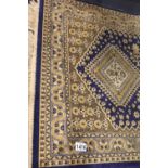 Eastern silk fringed rug, 100 x 60 cm. P&P Group 2 (£18+VAT for the first lot and £3+VAT for