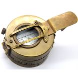 Brass cased compass marked TG London, D: 6.5 cm. P&P Group 1 (£14+VAT for the first lot and £1+VAT