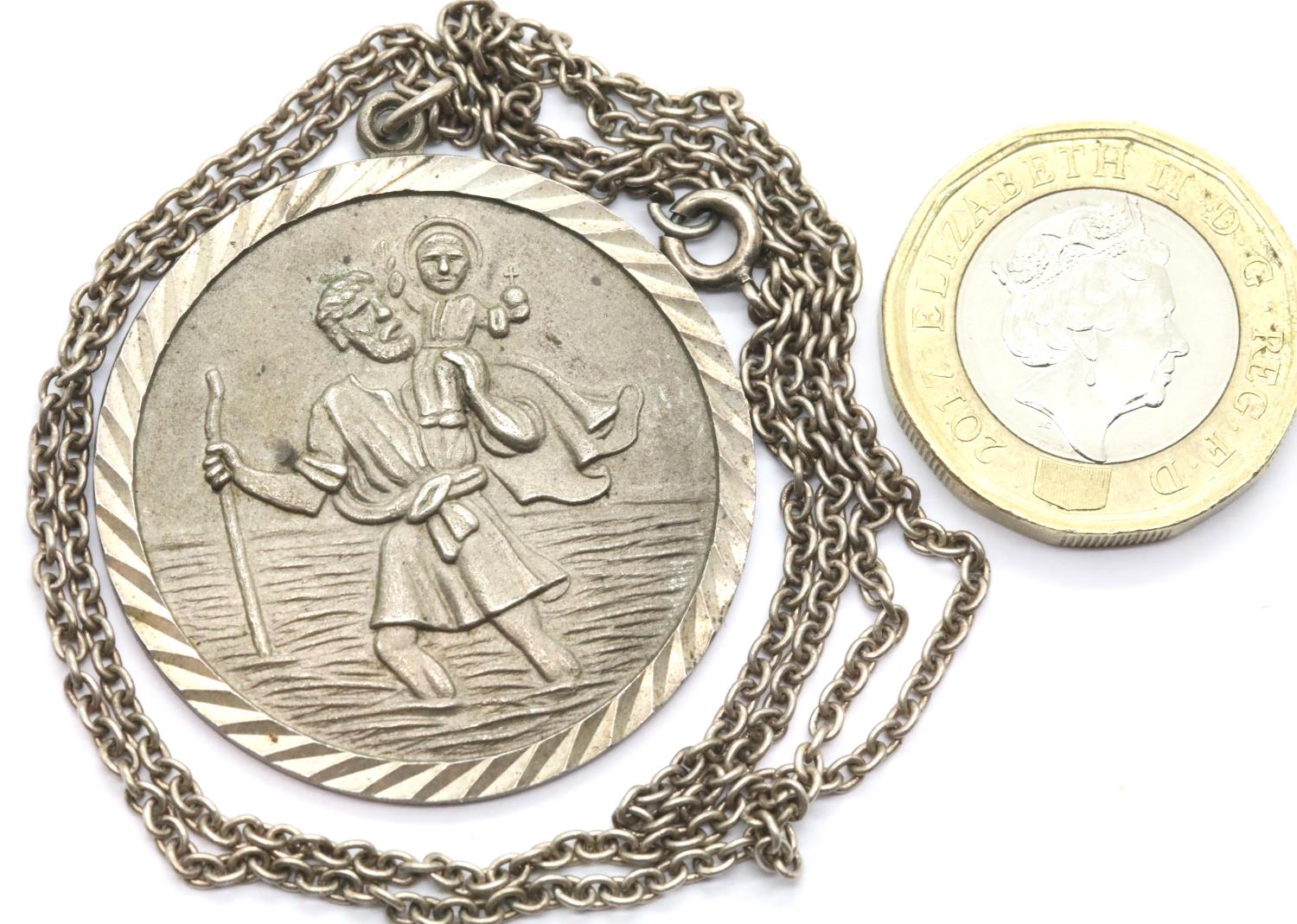 Silver vintage 35mm diameter St Christopher and chain. P&P Group 1 (£14+VAT for the first lot and £