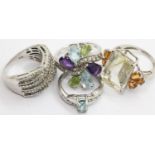 Four silver assorted stone set rings. P&P Group 1 (£14+VAT for the first lot and £1+VAT for