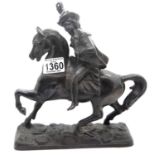 Hollow cast metal cavalier on horseback, H: 25 cm. P&P Group 2 (£18+VAT for the first lot and £3+VAT