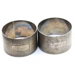 Two hallmarked silver napkin rings, mother and dad, combined 60g. P&P Group 1 (£14+VAT for the first