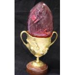 19th century Grand Tour gilt bronze twin handled chalice with relief casting raised on circular