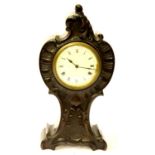 Edwardian mantel clock in a carved walnut case, H: 32 cm. Not available for in-house P&P