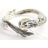 Tibetan silver dragon bangle. P&P Group 1 (£14+VAT for the first lot and £1+VAT for subsequent lots)
