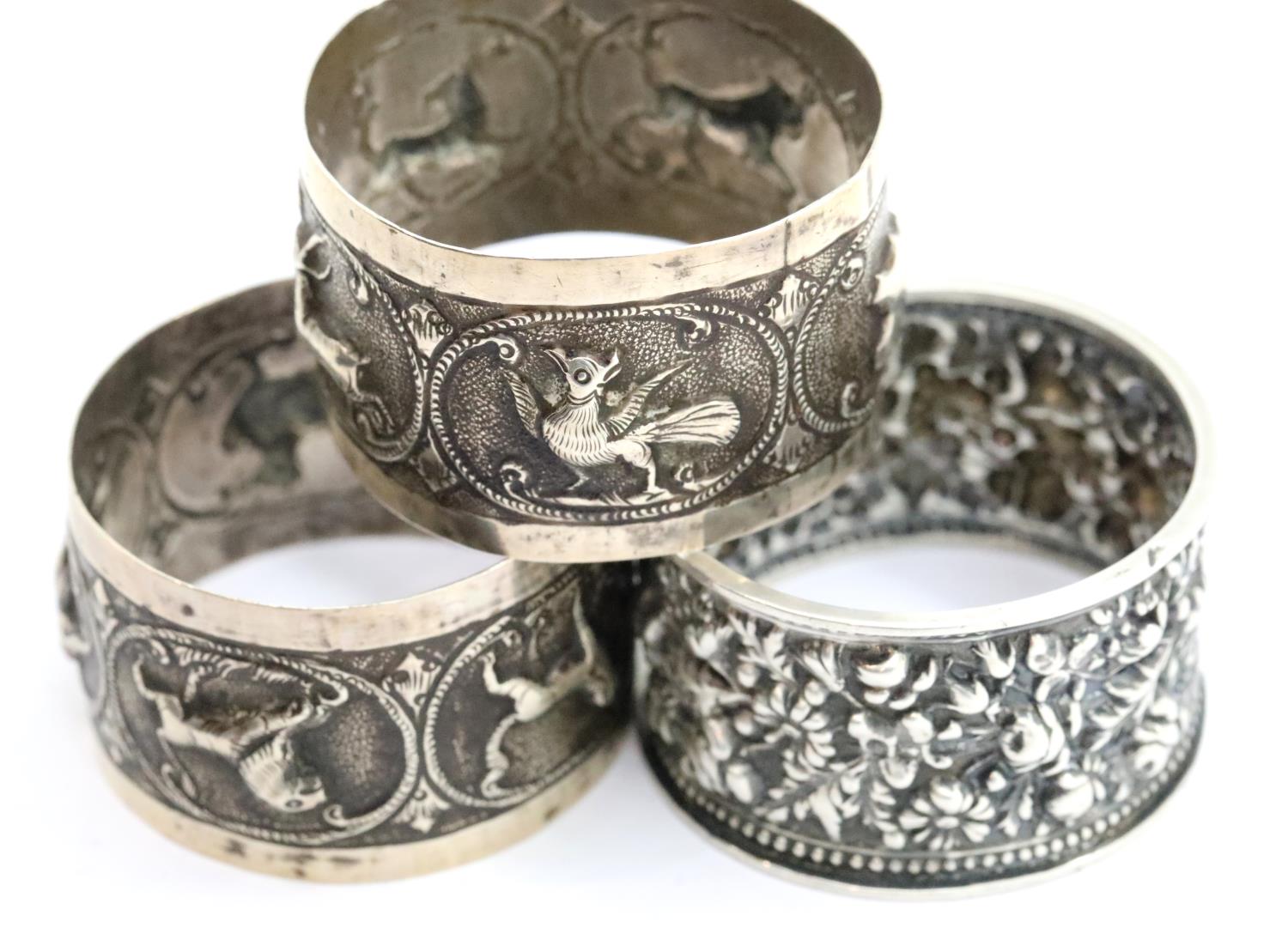 Three silver napkin rings, combined 58g. P&P Group 1 (£14+VAT for the first lot and £1+VAT for