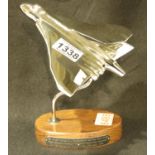 Chrome Vulcan bomber on wooden base, H: 21 cm. P&P Group 2 (£18+VAT for the first lot and £3+VAT for