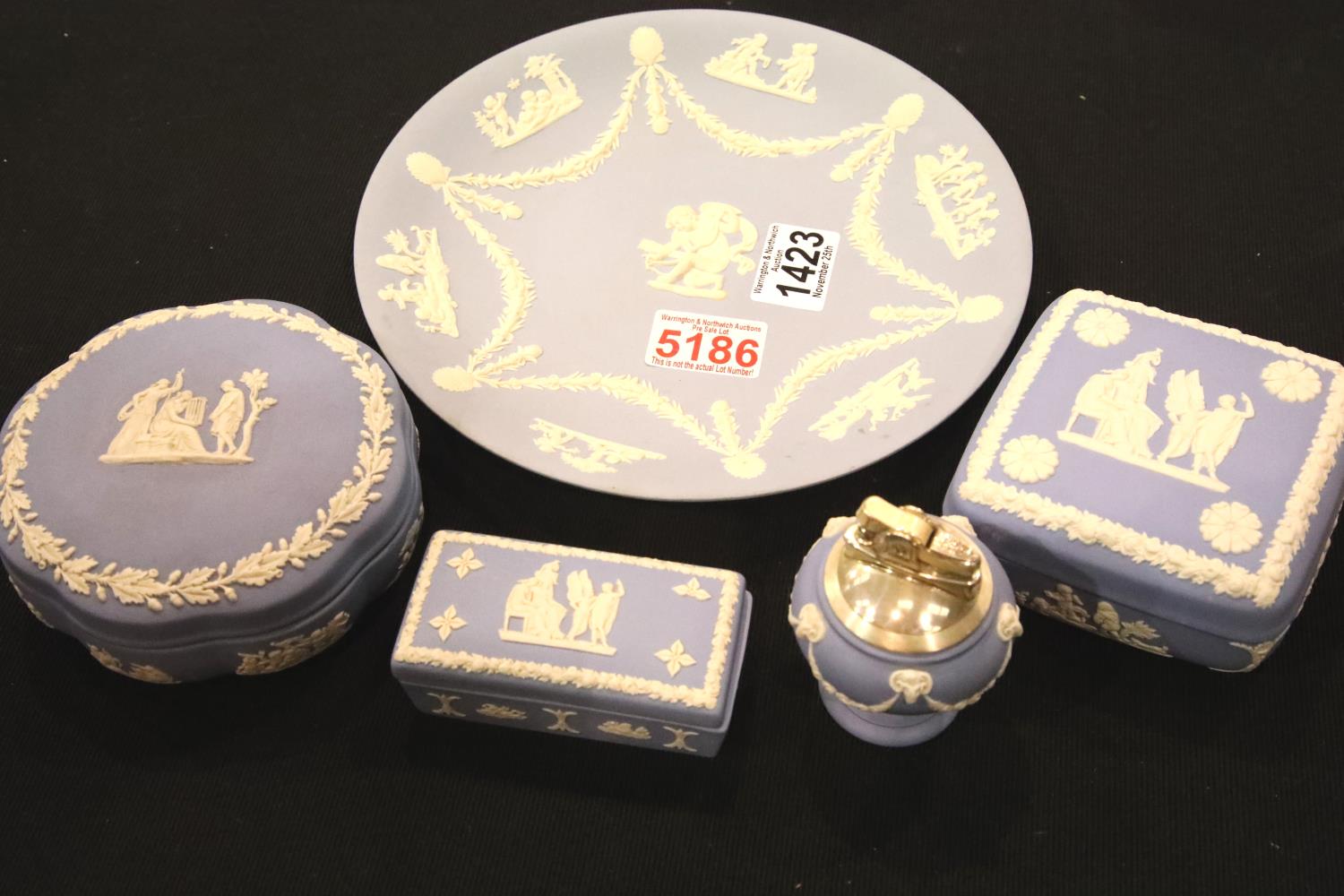 Wedgwood blue jasperware plate, table lighter and three lidded boxes. Not available for in-house P&P