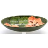Large oval Moorcroft Coral Hibiscus bowl, L: 23 cm. P&P Group 2 (£18+VAT for the first lot and £3+