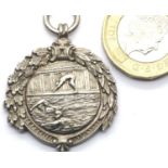 Hallmarked silver swimming medal, inscribed and dated 1921. P&P Group 1 (£14+VAT for the first lot