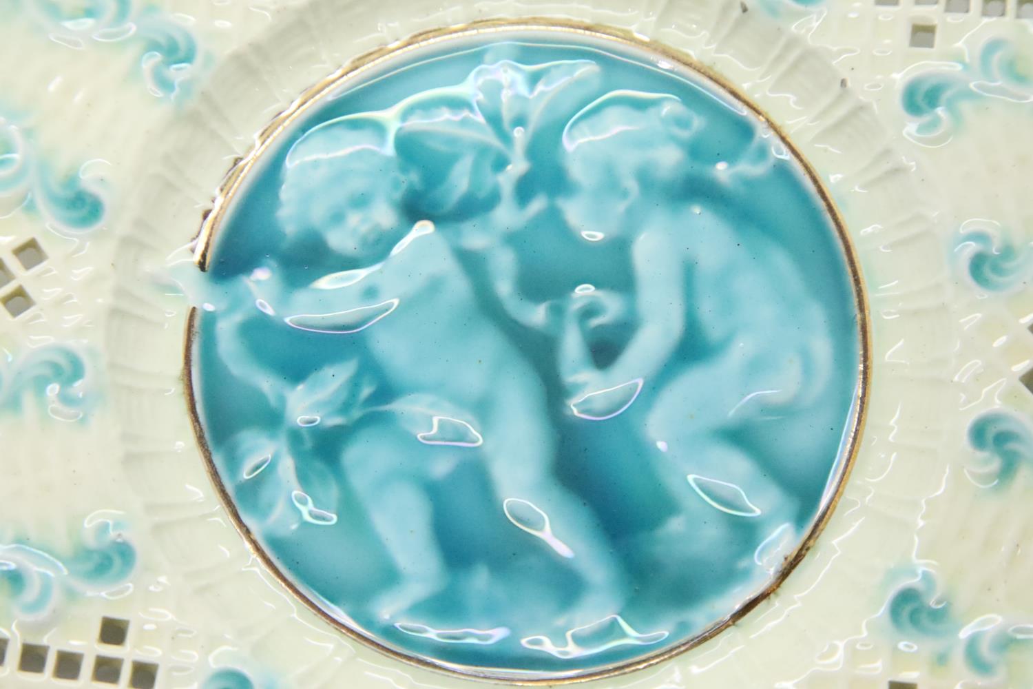 Pair of Villeroy & Boch? pate-sur-pate pierced plates featuring cherubs, D: 19.5 cm. P&P Group 3 (£ - Image 3 of 4