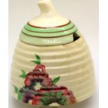 Clarice Cliff lidded Wilkinsons honey pot, H: 12 cm. P&P Group 2 (£18+VAT for the first lot and £3+