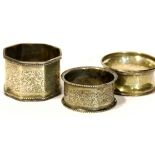 Three hallmarked silver napkin rings, combined 48g. P&P Group 1 (£14+VAT for the first lot and £1+
