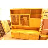 Large McIntosh teak retro wall unit with glazed doors to the upper section and storage to the