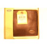 Fossil cased leather wallet. P&P Group 1 (£14+VAT for the first lot and £1+VAT for subsequent lots)