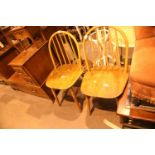 Pair of beech spindle back chairs. Not available for in-house P&P