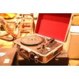 Walnut effect briefcase 3 speed turntable; USB recored in built in twin stereo speakers; RCA