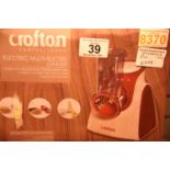Two boxed crofton electric multi slicer/graters. Not available for in-house P&P
