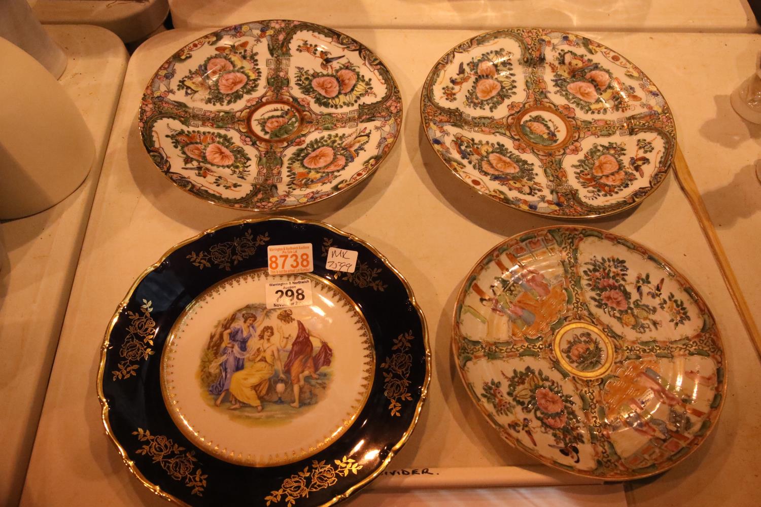 Four cabinet plates including three Oriental, one antique and limoges type plate. Not available