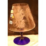 Large floral etched drinking glass and a blue coloured stem with base. Not available for in-house