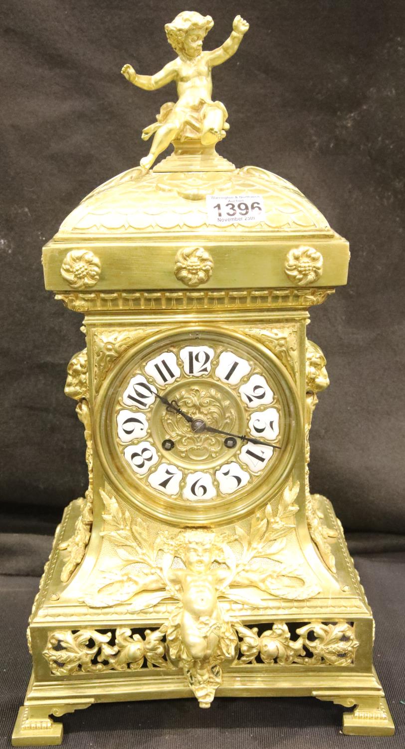 A 19th century French ormolu and lacquered brass 8 day table clock, chiming on a gong, circa 1870,