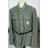 German WWII type Heer Officer representation comprising tunic with General Assault award and belt.