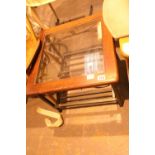 Glass topped table with wrought iron decoration. Not available for in-house P&P