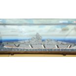 Oak and glass cased miniature representation of a German WWII battleship, possibly The Bismarck.