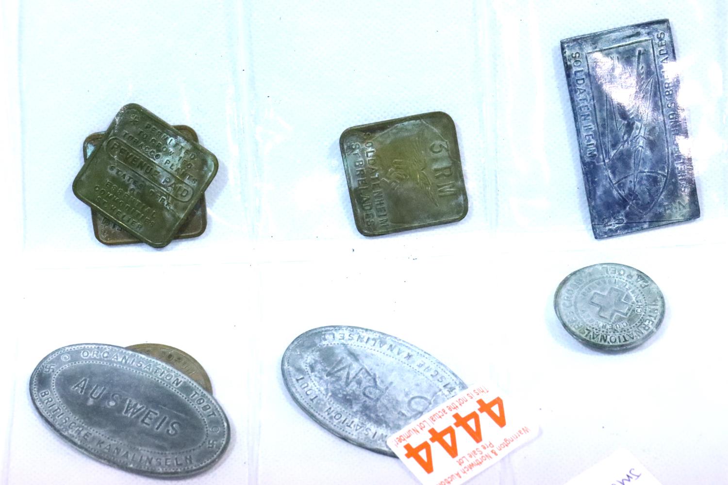 Collection of German WWII type tokens, including Guernsey Red Cross, Forum Cinema and others. P&P