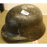 German WWII type Luftwaffe M40 helmet with remnants of snow camouflage paint. P&P Group 2 (£18+VAT