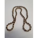 9ct white gold and yellow gold smoky quartz set necklace, 25.6g. P&P Group 1 (£14+VAT for the