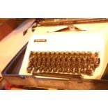 Plastic cased Adler typewriter. Not available for in-house P&P