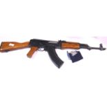 AK-47, gas powered automatic rifle. P&P Group 3 (£25+VAT for the first lot and £5+VAT for subsequent